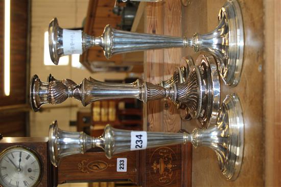 Two pairs silver plated candlesticks